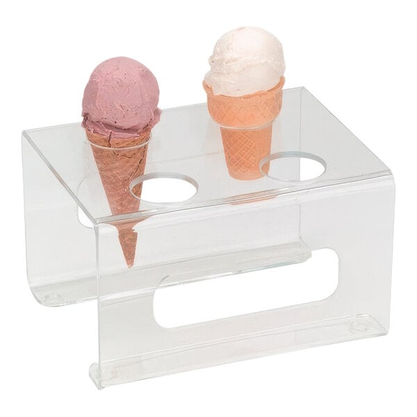 A Dispense-Rite clear acrylic holder with 2 ice cream cones in it.