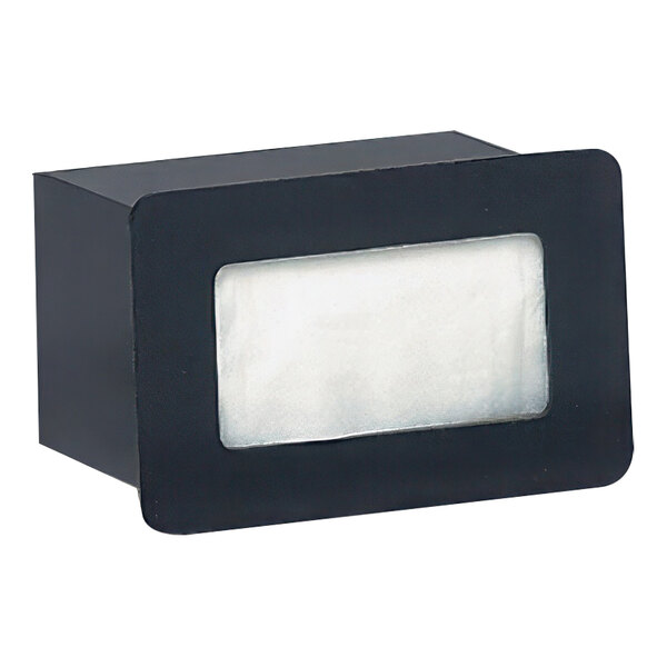A black box with a clear plastic window containing a white rectangular object.
