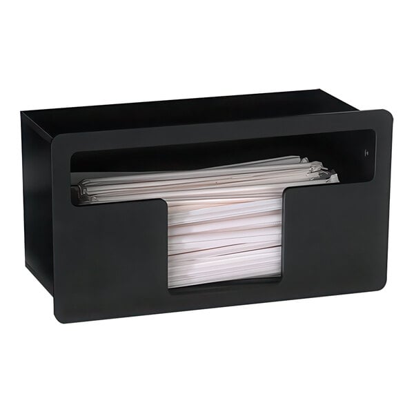 A black container with white paper and black straws inside.