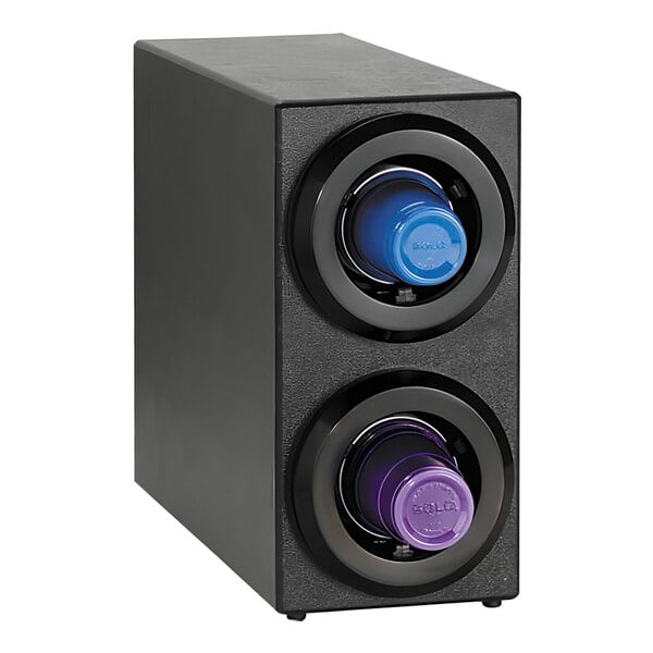 A black Dispense-Rite countertop cup dispenser with adjustable clips holding two plastic bottles with blue and purple caps.