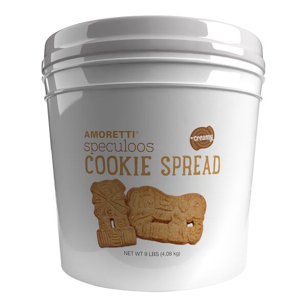 A white container of Amoretti Natural Creamy Speculoos Cookie Spread with a white lid.