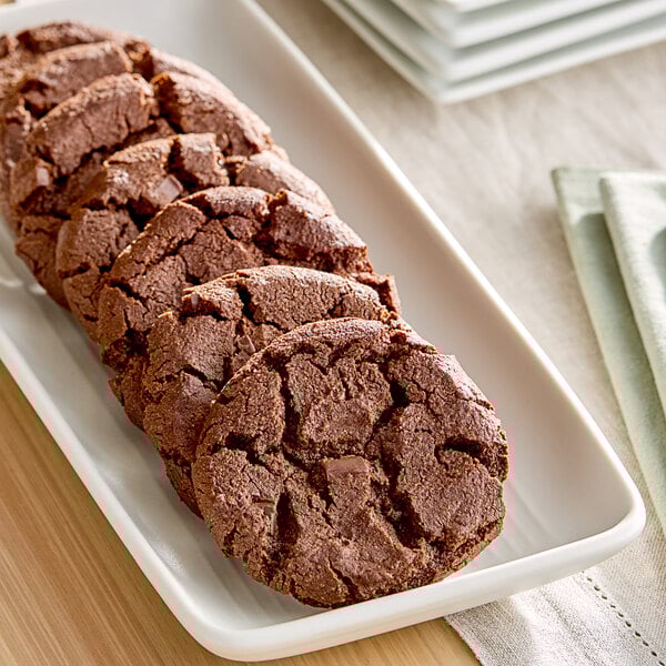 A plate of brown Sweet Loren's gluten-free fudgy brownie cookies.