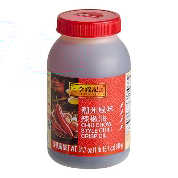 A plastic bottle of Lee Kum Kee Chiu Chow Chili Oil with a red label and lid.