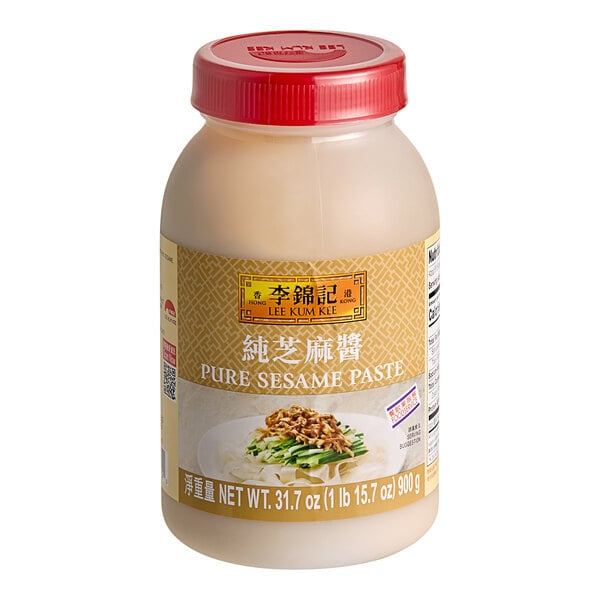 A plastic bottle of Lee Kum Kee Pure Sesame Paste with a label on it.