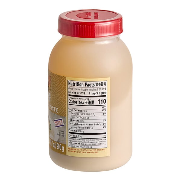 A plastic bottle of Lee Kum Kee Pure Sesame Paste with a red and white label.