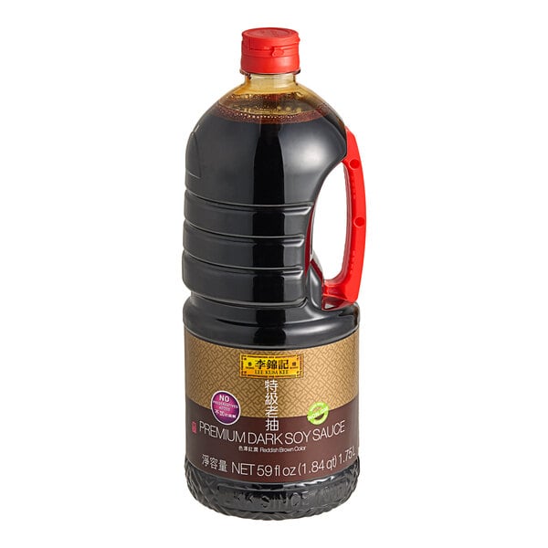 A bottle of Lee Kum Kee Premium Dark Soy Sauce with a red lid.