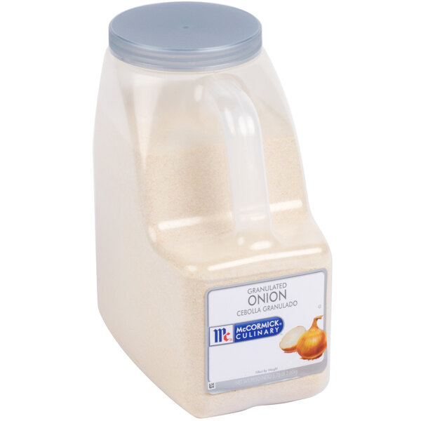 A plastic container of McCormick Culinary Granulated Onion with a handle.