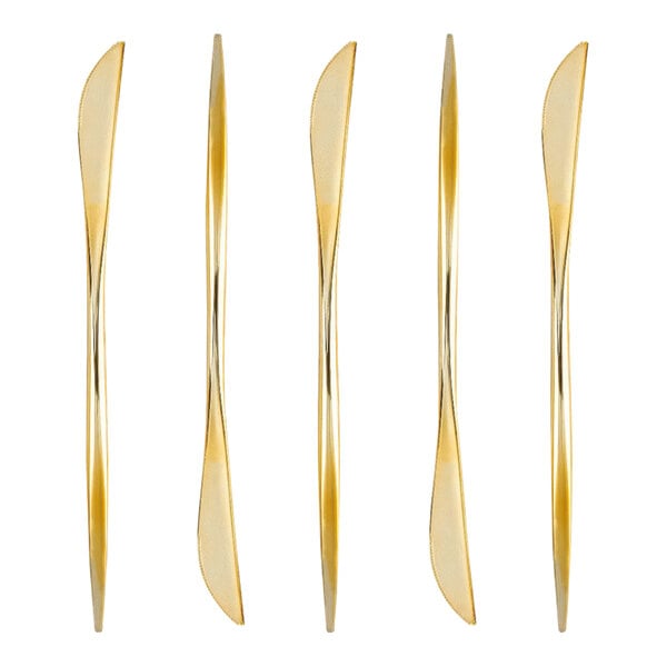 A row of Posh Setting gold plastic knives.