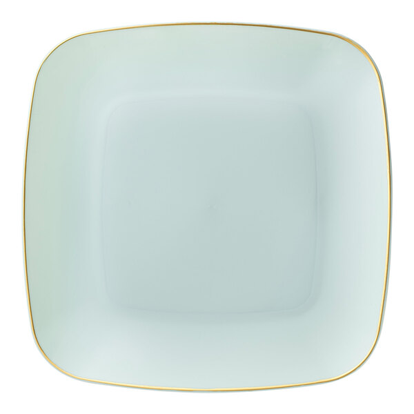 A white square plastic coupe plate with a turquoise square and gold trim.