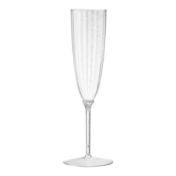 A clear plastic champagne flute with a stem.