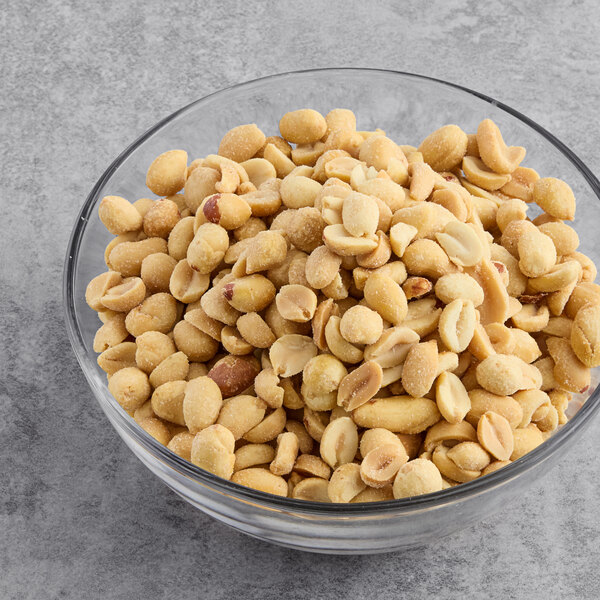 A bowl of Hometown Provisions roasted and salted extra large peanuts.