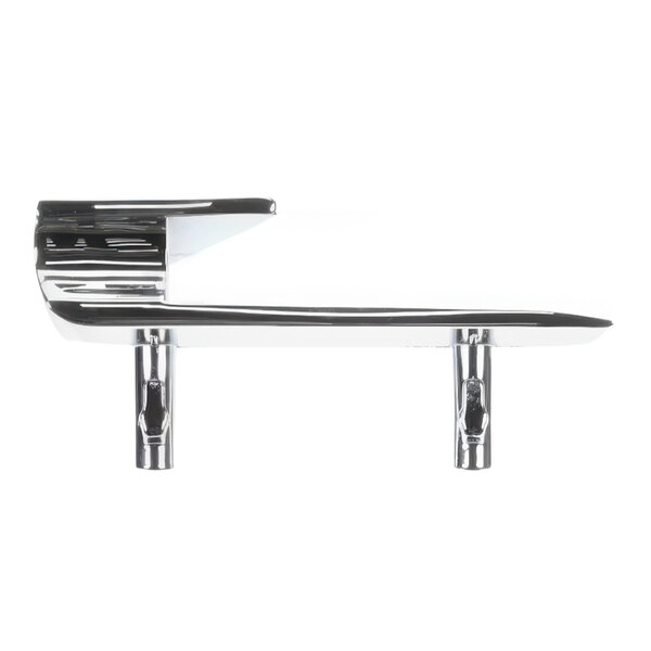 A silver Waring cup actuator with two holes on a shelf.