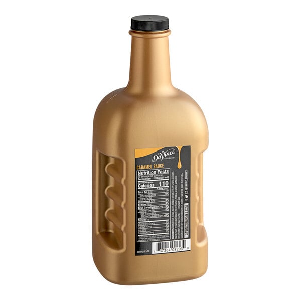 A bottle of DaVinci Gourmet Caramel Flavoring Sauce with a black label on a white background.