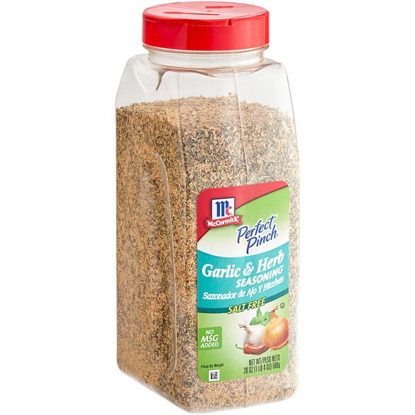 A white and green container of McCormick Perfect Pinch Salt-Free Garlic and Herb Seasoning.