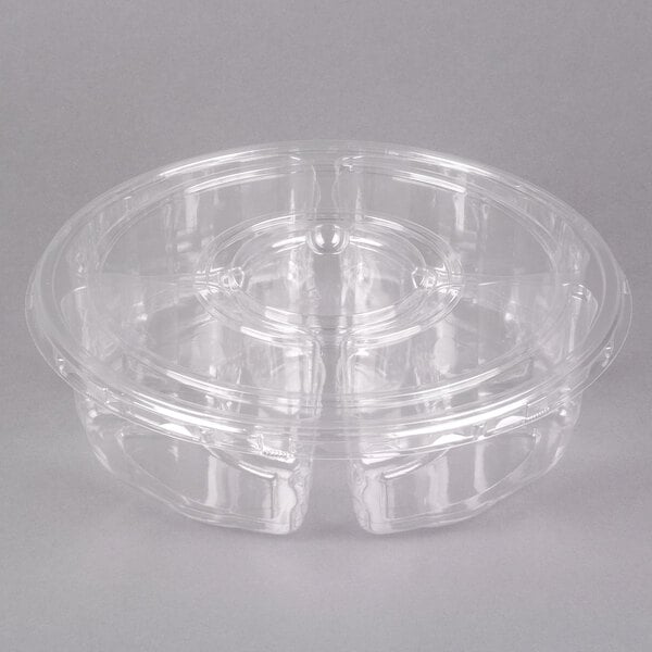 A clear plastic Polar Pak round platter with 5 compartments and a lid.