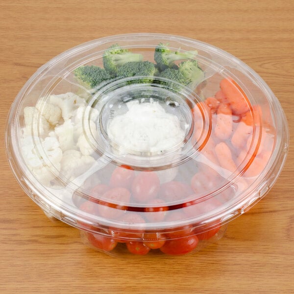 A Polar Pak clear plastic 5-compartment platter with vegetables and white dip.