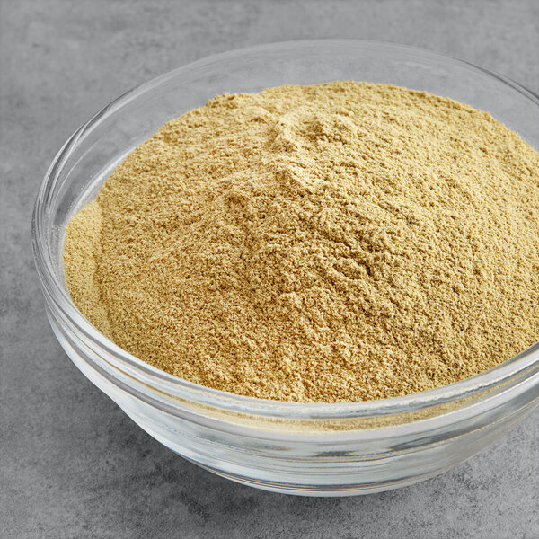 A bowl of McCormick Culinary Ground Rosemary powder.