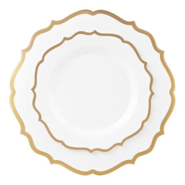 A white plastic plate with a gold rim.