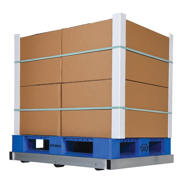 A Vestil aluminum pallet dolly with a stack of cardboard boxes on it.