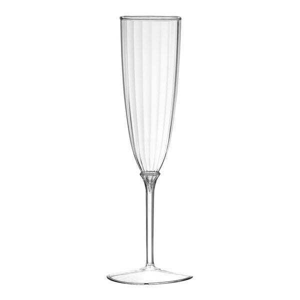 A clear plastic champagne flute with a long stem.