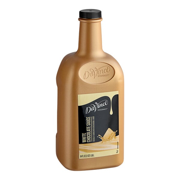 A brown bottle of DaVinci Gourmet White Chocolate Flavoring Sauce with a black label.