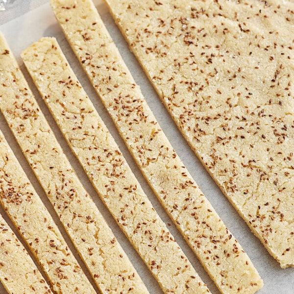 A tray of shortbread cookies with sprinkles on them.