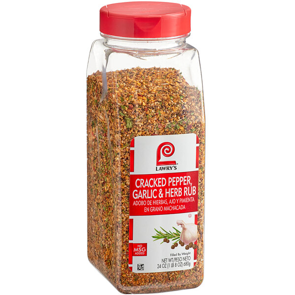 A close-up of a jar of Lawry's Cracked Pepper, Garlic, and Herb Rub seasoning.