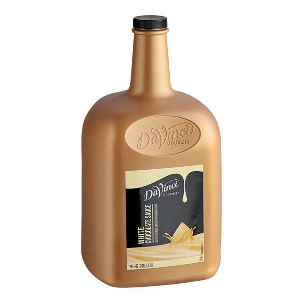 A bottle of DaVinci Gourmet White Chocolate flavoring sauce with a black cap and label on a white background.