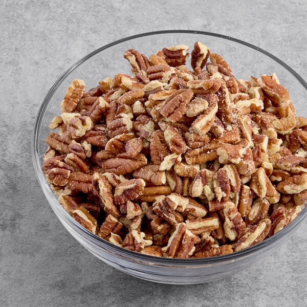 A bowl of Hometown Provisions raw medium size pecan pieces.