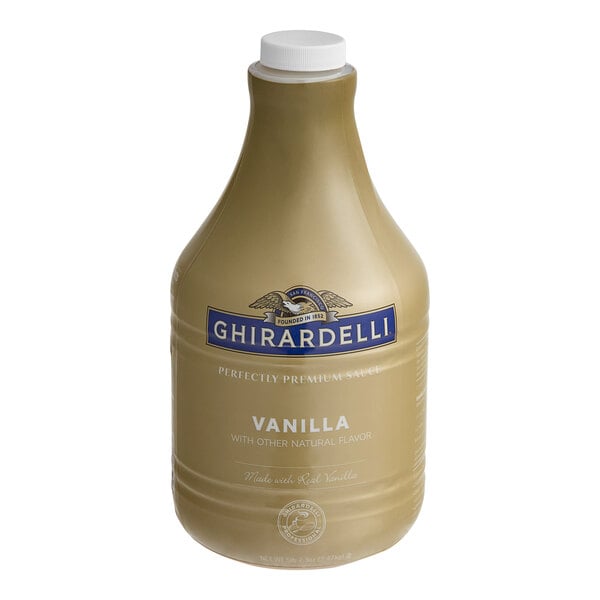 A close-up of a Ghirardelli Vanilla Flavoring Sauce bottle.