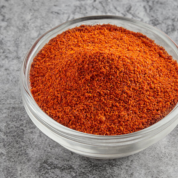 A bowl of McCormick Culinary Ground Cayenne Pepper.
