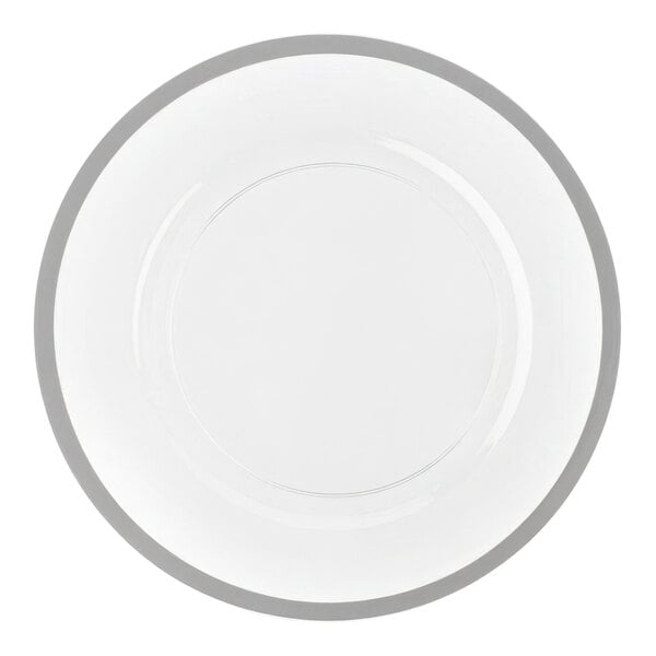 A clear plastic charger plate with a silver wide rim.