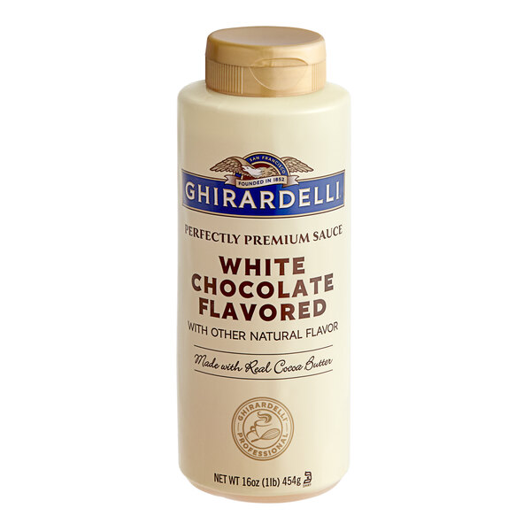 A white bottle of Ghirardelli White Chocolate flavoring sauce with a brown lid and white label with blue and white text.