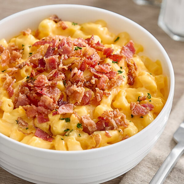 A bowl of macaroni and cheese with Daily's diced jalapeno bacon.