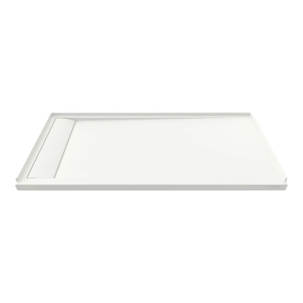 A white rectangular American Standard shower base.