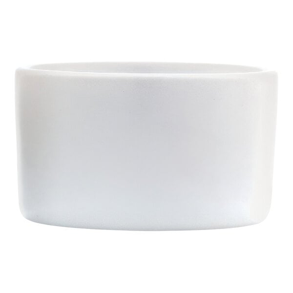 A Libbey Porcelana white porcelain ramekin.