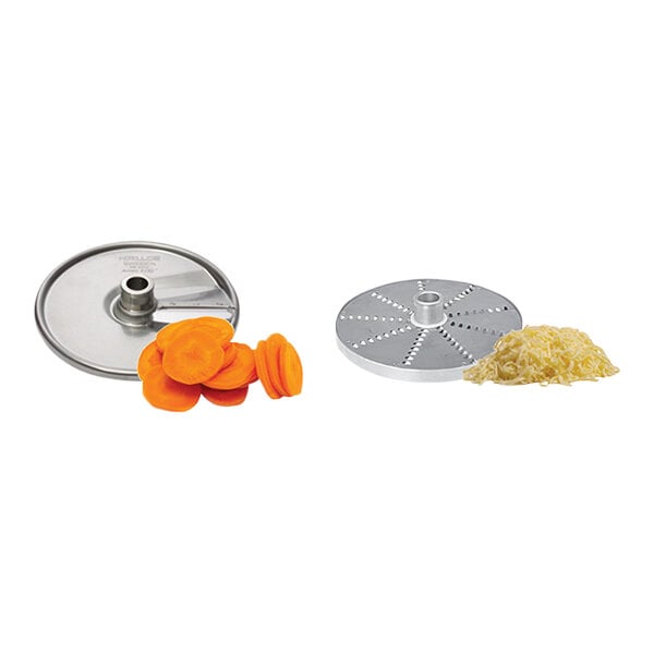 A Centerline by Hobart CCH Series food processor with a grater disc and a slicer disc, processing carrots.