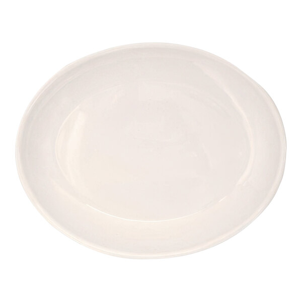A white Libbey porcelain oval platter with a curved edge.