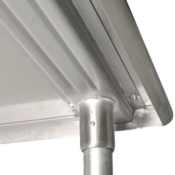 A stainless steel Advance Tabco mixer table with a galvanized metal pole.
