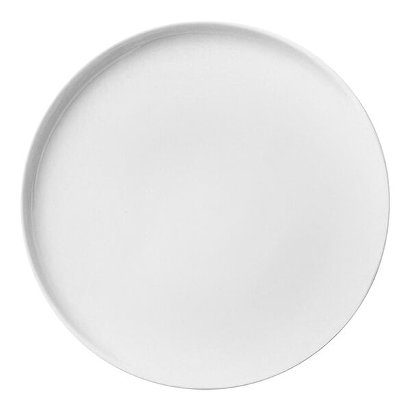A Libbey Porcelana white porcelain plate with a round rim.