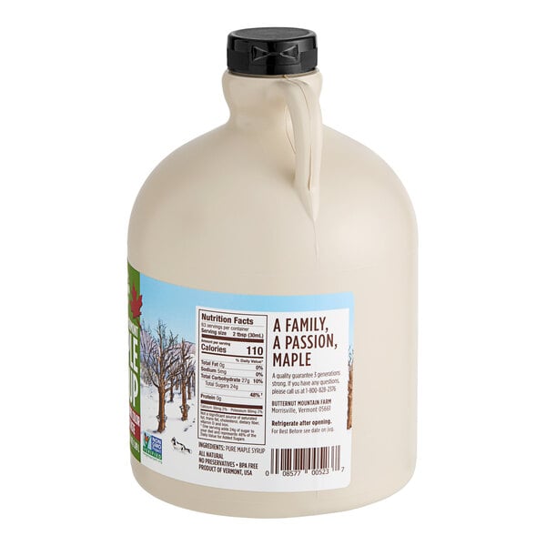 A white jug of Butternut Mountain Farm Vermont maple syrup.