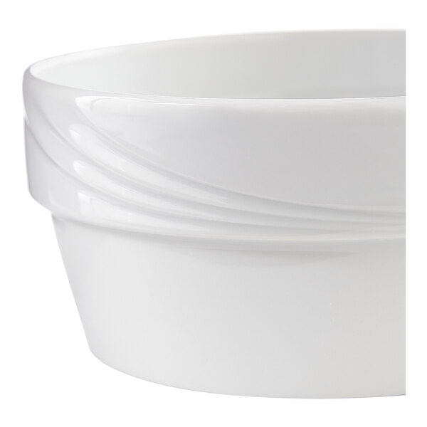 A white porcelain round soup or oatmeal bowl with a subtle embossed design.