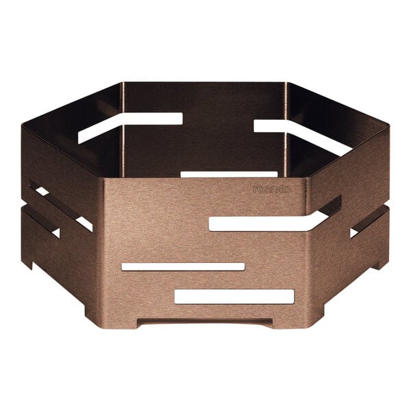 A bronze metal hexagon riser with holes in it.
