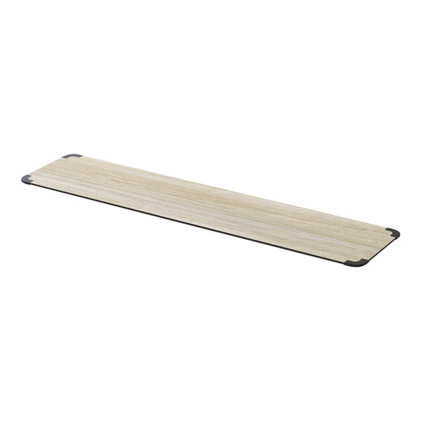 A rectangular wood shelf with black corners.
