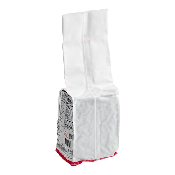 A white plastic bag of Bossen Fast Cook Big Tapioca Boba Pearls with a red and white label.