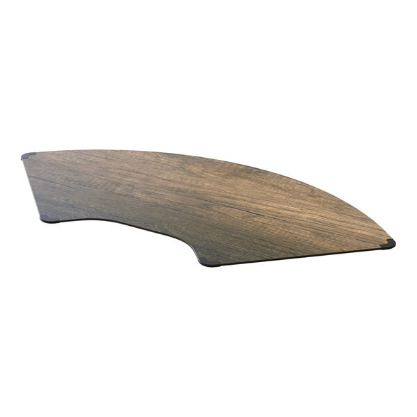A close-up of a Rosseto walnut quarter round table shelf with a curved edge.