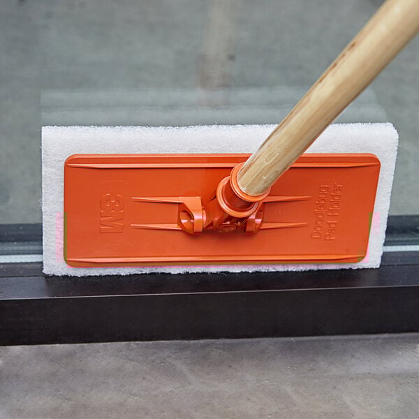 A white 3M Doodlebug light-duty cleaning pad.