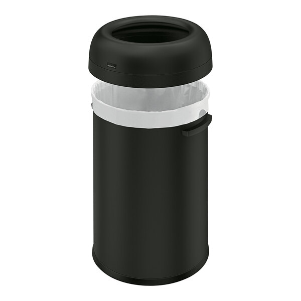 A simplehuman matte black steel round open top trash can with a lid.