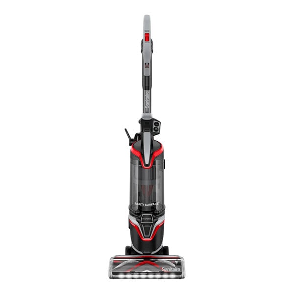 A red and black Sanitaire Response bagless upright vacuum cleaner.
