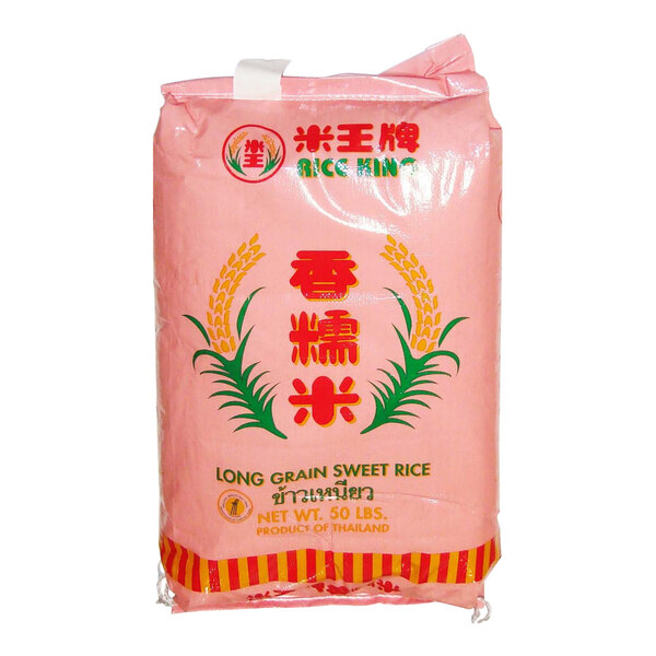 A pink bag of Rice King Long Grain Sweet Thai Rice with text on it.